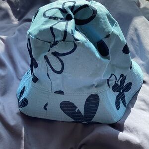 Blue Bucket Hat with Black Floral Design